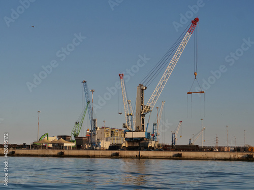 industrial port with ship and heavy duty crane brindisi. 