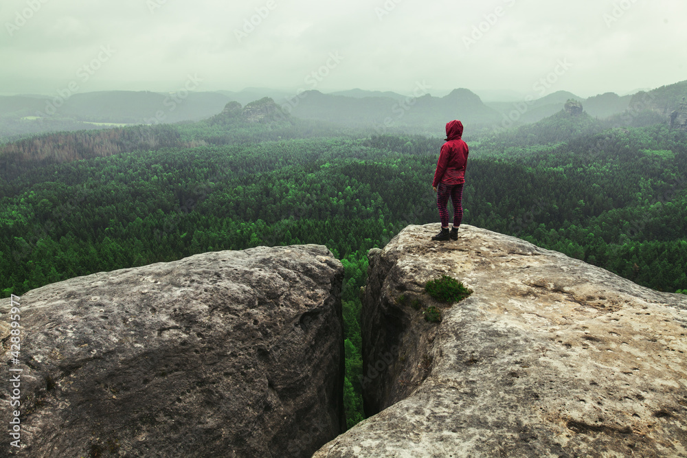 hiker on top of mountain