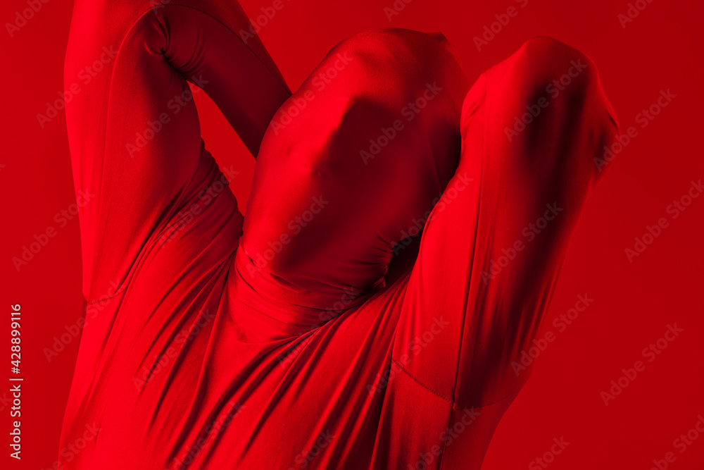 crazy screaming red man on a red background. figure in a leotard crazy screaming red man on a red background. figure in a leotard