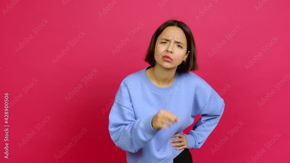 Young latin woman doing silence gesture over isolated background Young latin woman doing silence gesture over isolated background