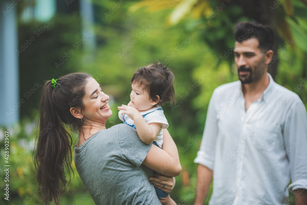 happy family with father and mother, and son child baby, childhood and parent in love together, smile kid and fun at home, enjoy outdoor life in summer happy family with father and mother, and son child baby, childhood and parent in love together, smile kid and fun at home, enjoy outdoor life in summer