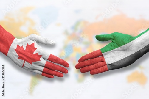 Canada and United Arab Emirates - Flag handshake symbolizing partnership and cooperation