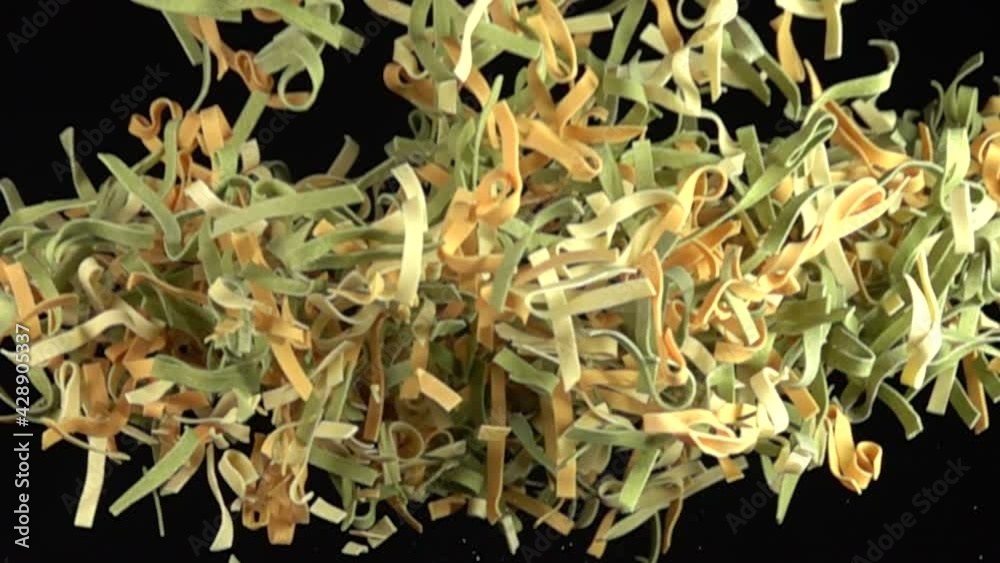 Pasta explosion on black background 500fps Pasta explosion on black background 500fps