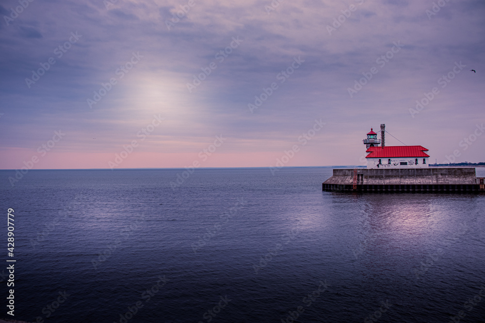 Obraz premium lighthouse at sunset