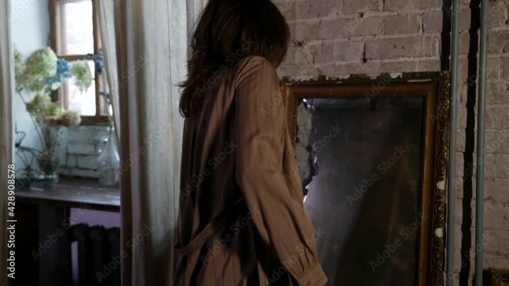 voyeurism fetish, woman is wearing lingerie and gown is dancing alone in her room, looking in old vintage mirror