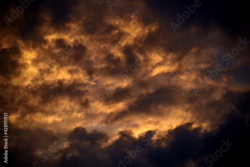 Background of the dramatic cloudy sky in the dusk