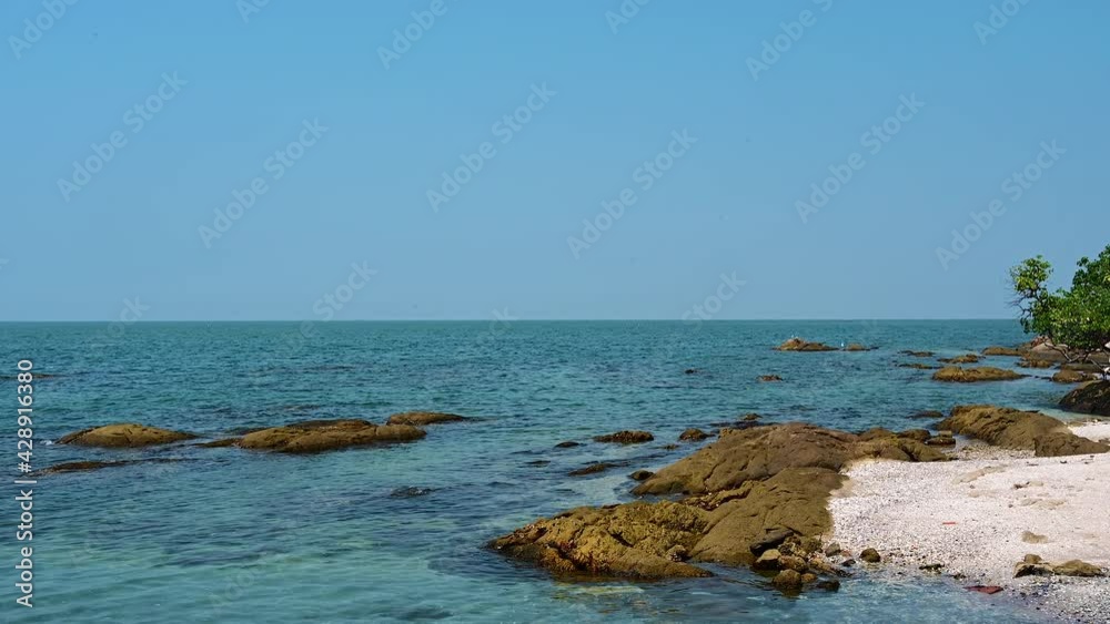 Soft wave with the blue ocean on a sandy beach. Holiday time vacation. Soft wave with the blue ocean on a sandy beach. Holiday time vacation.