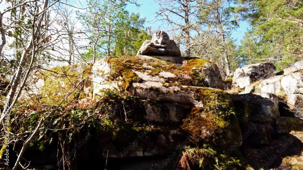Fantasy Troll Sculpture Placed On Top Of Mossy Rocks At Gamleby Sculpture Park In Gamleby, Sweden. - close up
