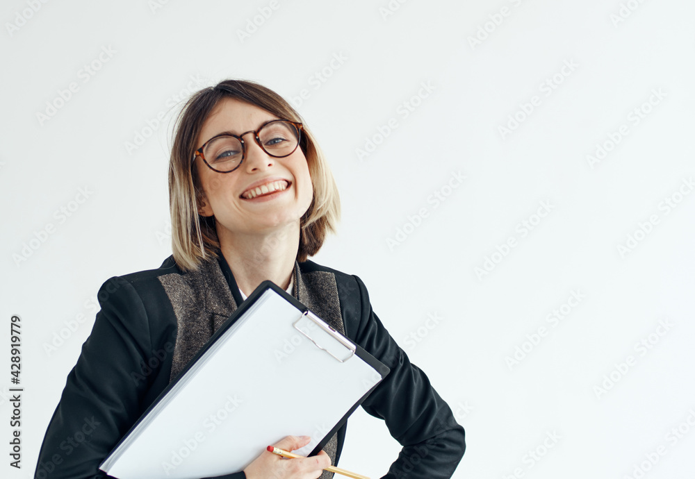 Woman download with documents in hands on a light background Woman download with documents in hands on a light background
