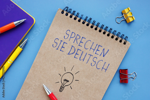 Conceptual photo about Sprechen Sie Deutsch with handwritten phrase. photo