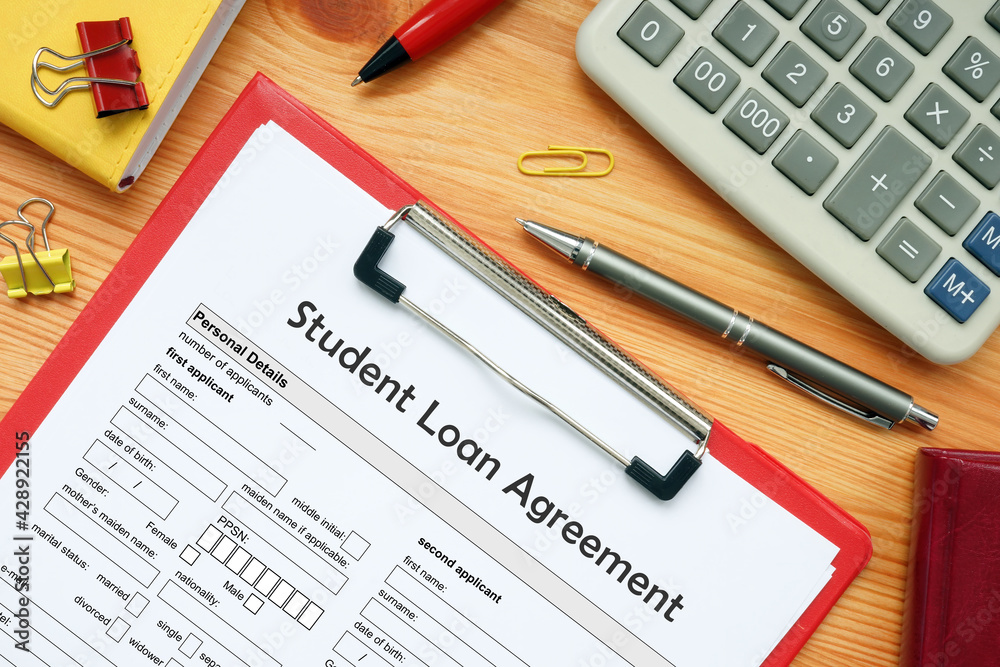 Financial concept meaning Student Loan Agreement with sign on the bank form Financial concept meaning Student Loan Agreement with sign on the bank form