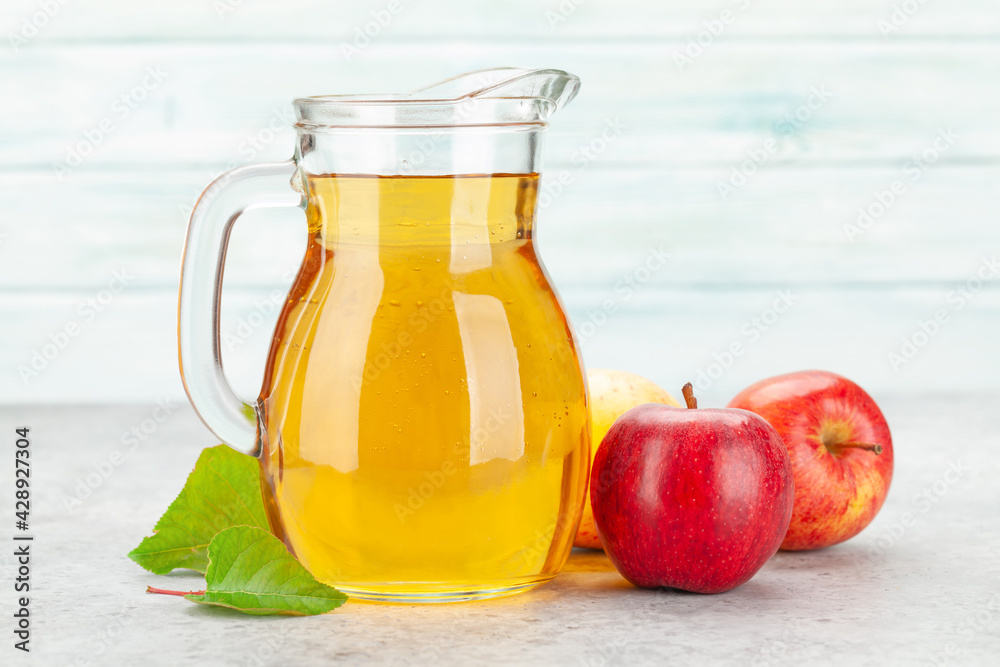 Apple juice and red apple fruits Apple juice and red apple fruits
