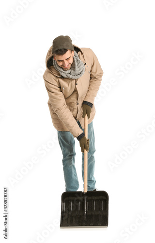 Man with shovel for removin...