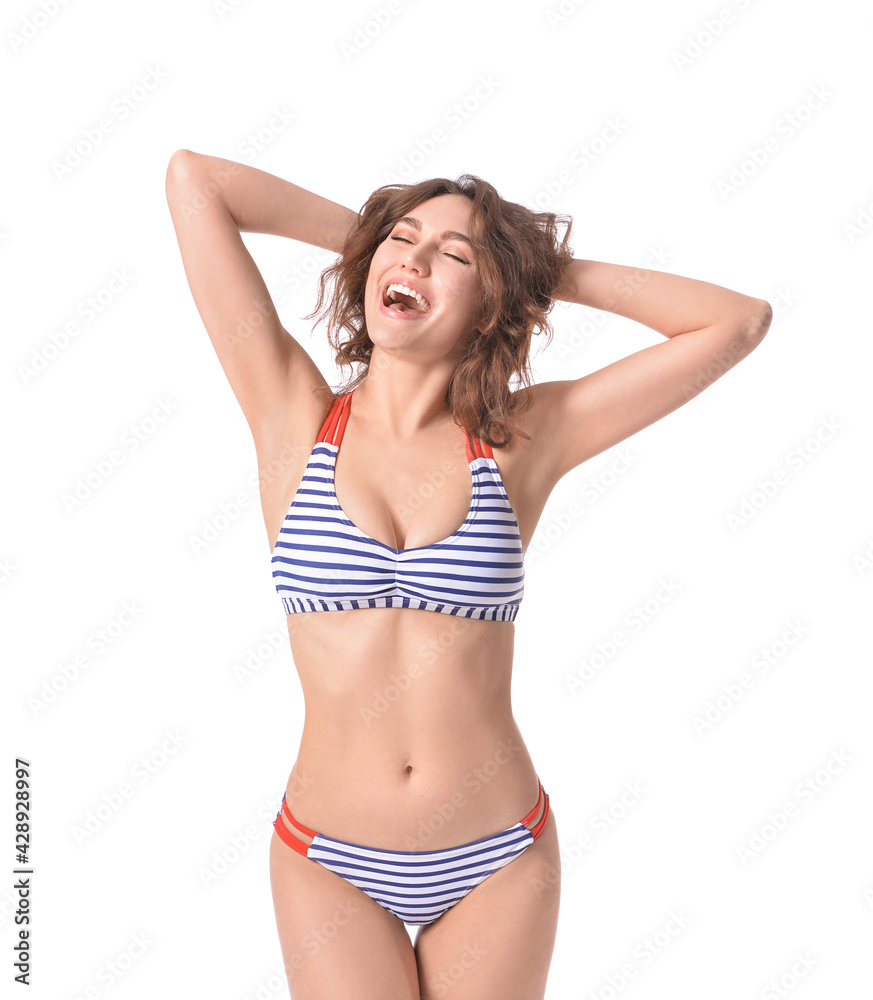 Fototapeta premium Beautiful young woman in swimsuit on white background