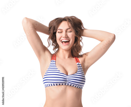 Beautiful young woman in swimsuit on white background © Pixel-Shot