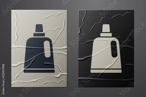 White Plastic bottle for laundry detergent, bleach, dishwashing liquid or another cleaning agent icon isolated on crumpled paper background. Paper art style. Vector