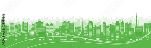ビルのある都市風景のイラスト（緑のシルエット）