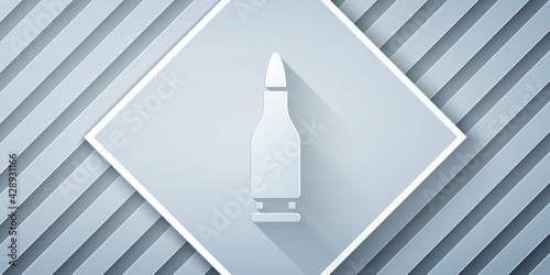 Paper cut Bullet icon isolated on grey background. Paper art style. Vector