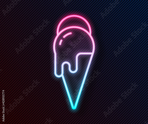 Glowing neon line Ice cream in waffle cone icon isolated on black background. Sweet symbol. Vector