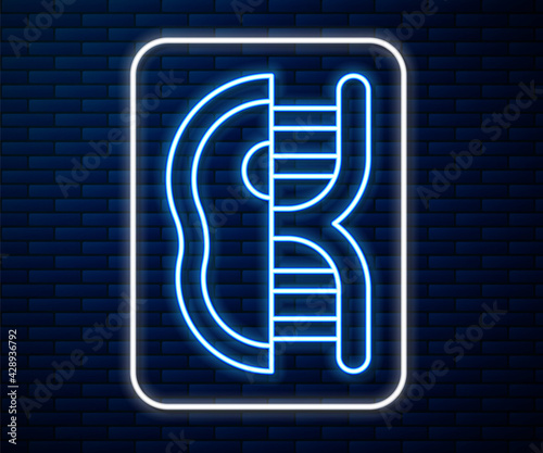 Glowing neon line Genetically modified meat icon isolated on brick wall background. Syringe being injected to meat. Vector