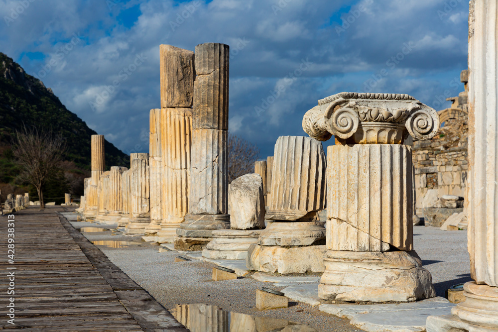 View of remaining elements of State Agora columns with Corinthian capitals in ancient Greek city of Ephesus, Izmir province, Turkey