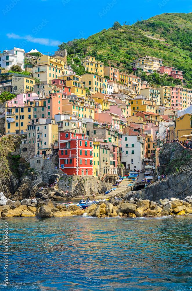 Riomaggiore in Cinque Terre, Italy, view at the town from mountain trail