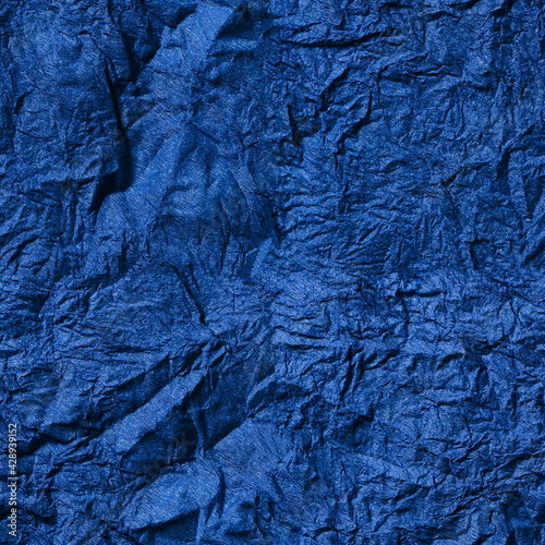 Seamless texture. Abstract blue background. Crumpled blue paper background.Textured backdrop. Paper texture.
