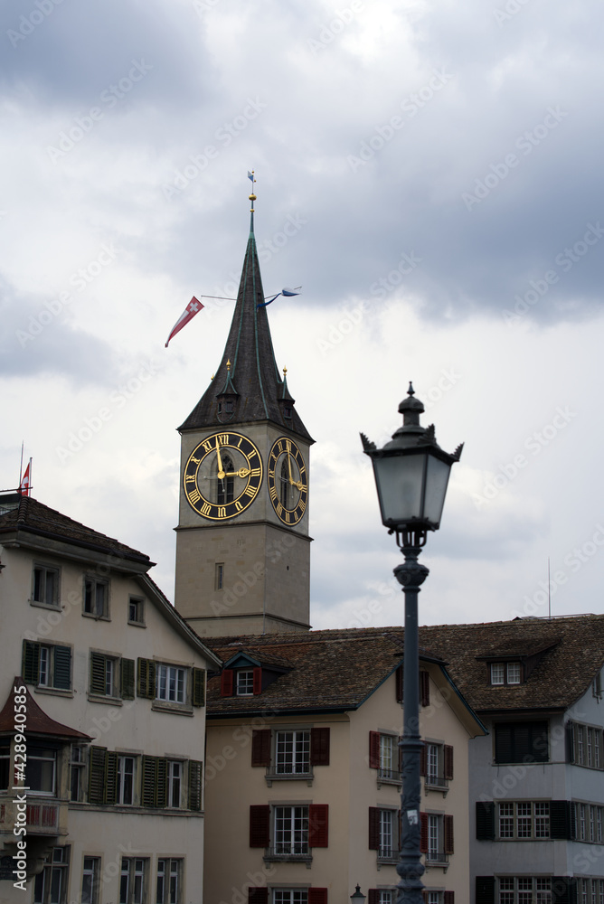 Tower of church Saint Peter at the old town of Zurich. Photo taken April 19th, 2021, Zurich, Switzerland.