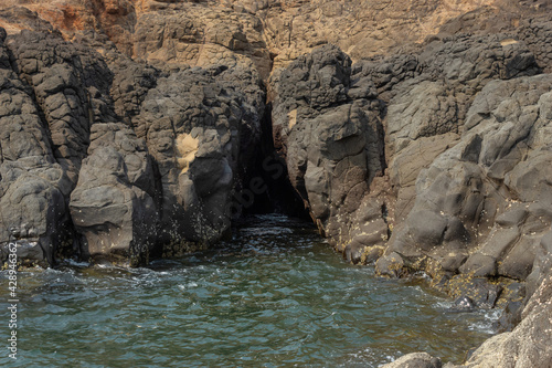 Rock formations at Hedvi beach, Hedvi, Konkan, Maharashtra, India. photo