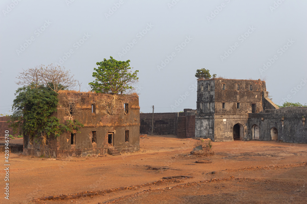 Ruined structures inside Jaigad Fort, Jaigad, Ratnagiri, Maharashtra, India. Built by Bijapur Kings in the 16th century. Ruined structures inside Jaigad Fort, Jaigad, Ratnagiri, Maharashtra, India. Built by Bijapur Kings in the 16th century.
