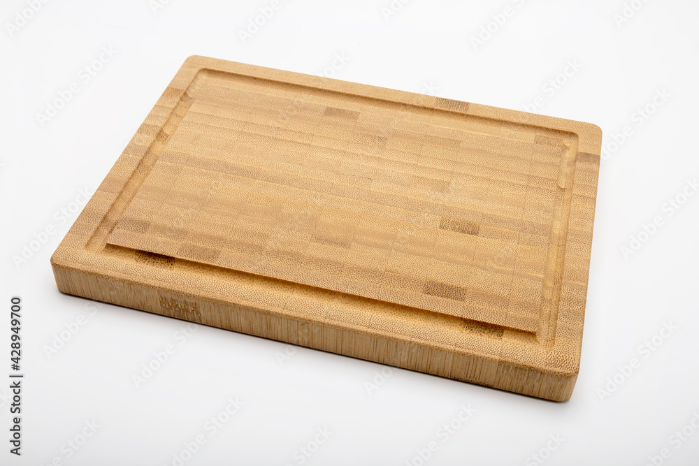 Bamboo cutting board on white background , Empty wooden plate