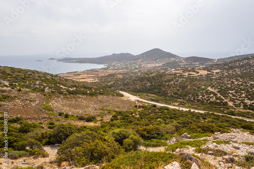 Fototapeta Naklejka Na Ścianę i Meble -  South coast of Antiparos Island. The road among the hills. Cyclades islands, Greece