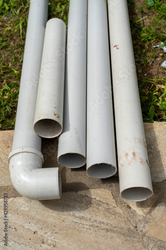Image of some plastic pipes in an area