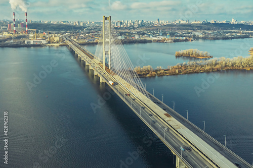 Aerial view from drone on South Bridge in Kiev, city skyline and landscape of Dnipro river, Ukraine