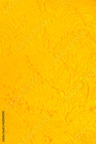 Yellow paint background. Minimal abstract creative wallpaper. Trendy colours of summer