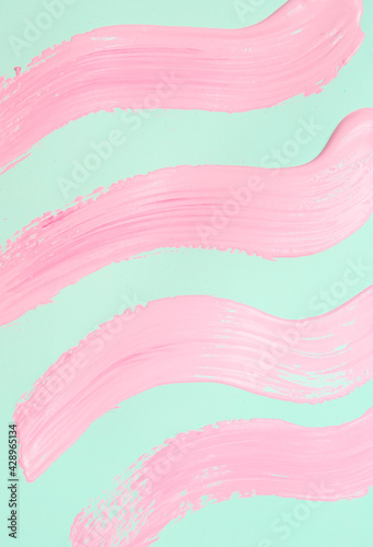 Light Pink paint brush strokes abstract minimal creamy texture, make-up creative wallpaper concept.