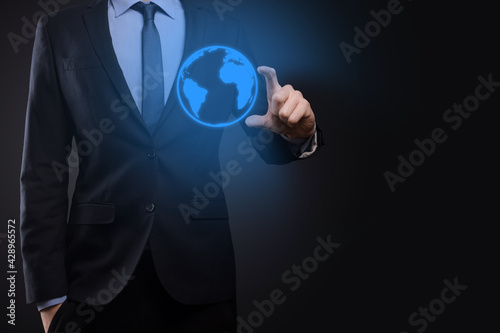 Businessman man hand holding Earth icon , digital globe