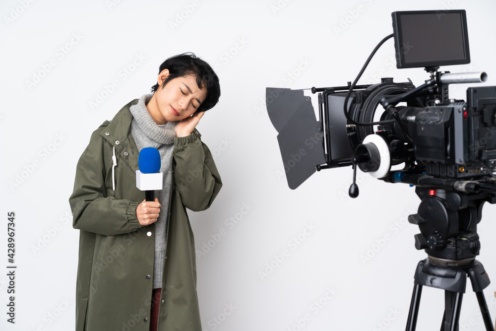 Reporter Vietnamese woman holding a microphone and reporting news making sleep gesture in dorable expression