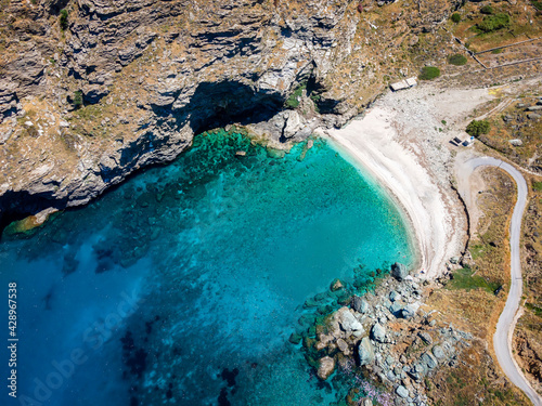 Fototapeta Naklejka Na Ścianę i Meble -  The secluded Syneti beach with turqouise sea on the Greek island of Andros, Cyclades