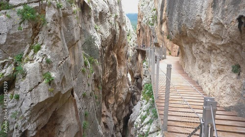 People in Royal Trail (El Caminito del Rey) in Gorge of the Gaitanes Chorro, Malaga province, Spain.