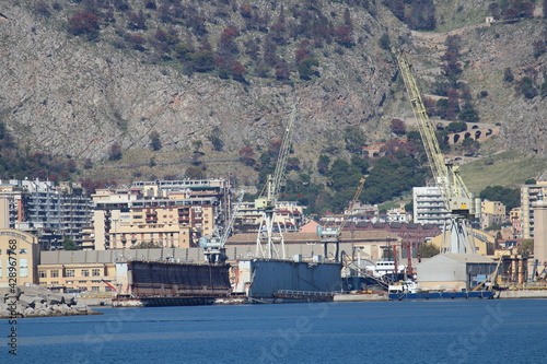 Palermo shipyard in Italy, ships in storage and cranes in the shipyard