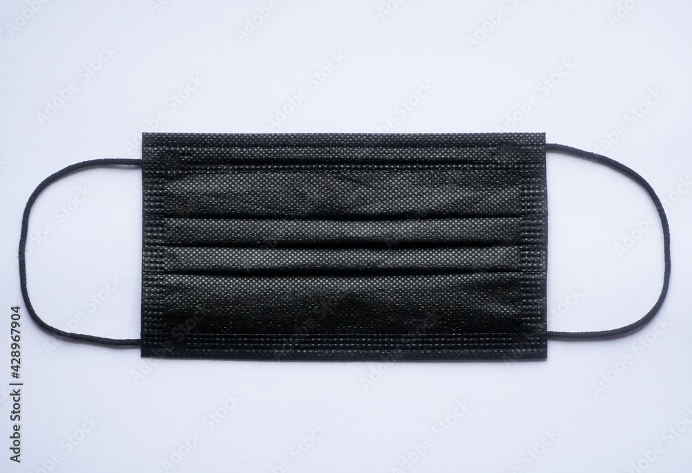 the mask. protective mask against SARS virus cov 2. black mask.