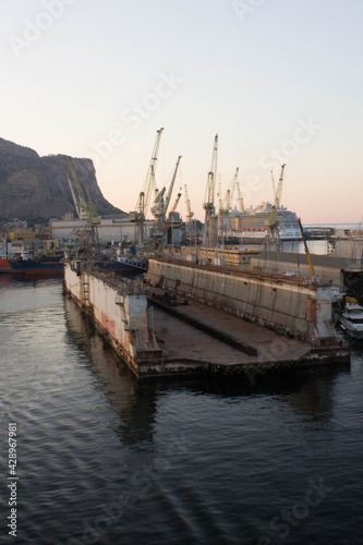 Palermo shipyard in Italy, ships in storage and cranes in the shipyard