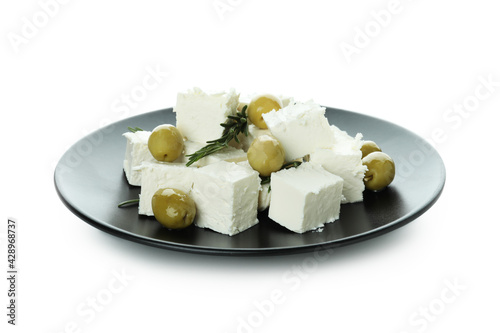 Plate with feta cheese, olives and rosemary isolated on white background