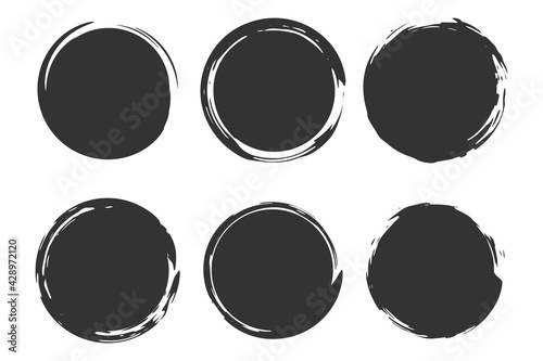 Set of circle brush strokes, hand drawn paint frame for design logo, banner, card. Vector illustration isolated on white background.