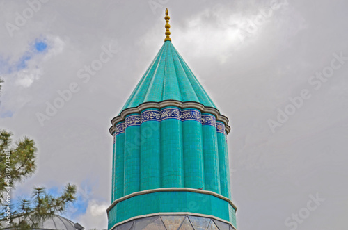 Mevlana Museum known as the Green Mausoleum or Green Dome. Mevlana Museum is located in Konya, Turkey. photo