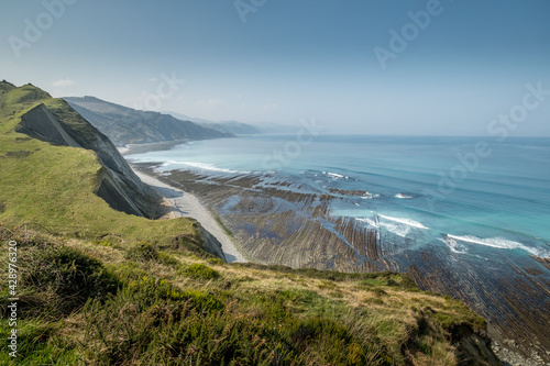 Hiking on the coast between Zumaia and Deba on the Camino del Norte, Basque Country