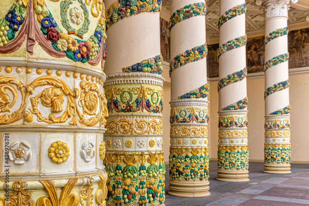 Columns of the Belarus pavilion at VDNH, decorated with tiles in the form of garlands of fruits and vegetables