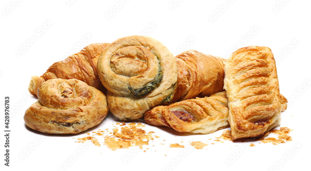 Different breakfast pastries isolated on white background