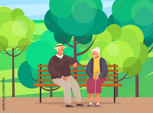 Old woman and man are resting and sitting on bench in park. Meeting of retirees from nursing home